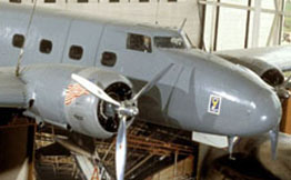 A Boeing 247-D hanging from the ceiling of the Smithsonian National Air and Space Museum